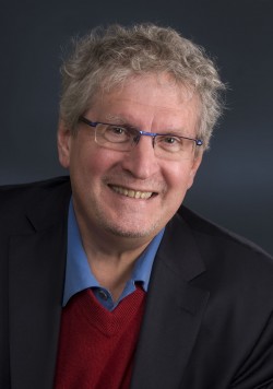Dr. Bruce McManus, Director